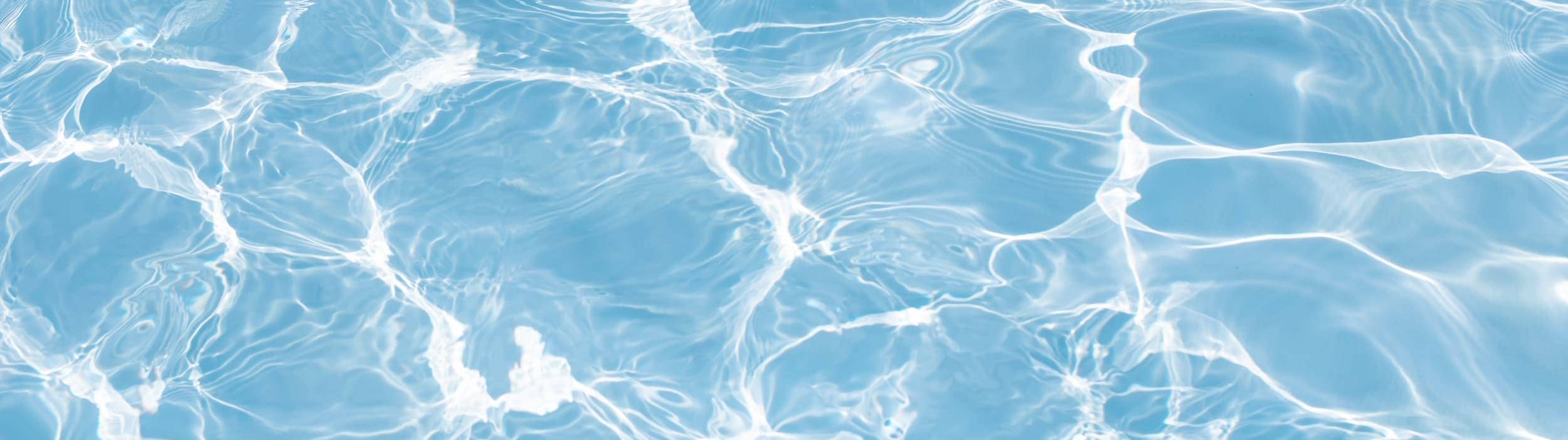 Clear swimming pool water surface